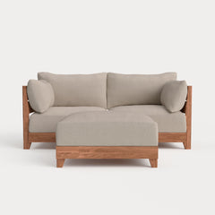 Dwell™ Modular Teak Outdoor Loveseat + Ottoman | Classic Canvas in Sand
